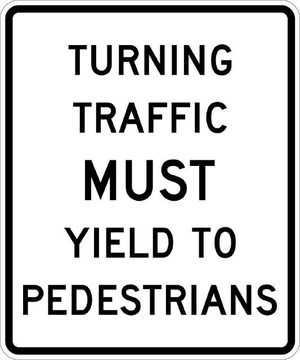 TURNING TRAFFIC MUST YIELD TO